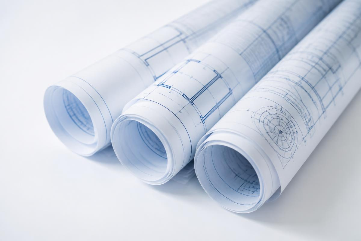 Rolled engineering blueprint drawings
