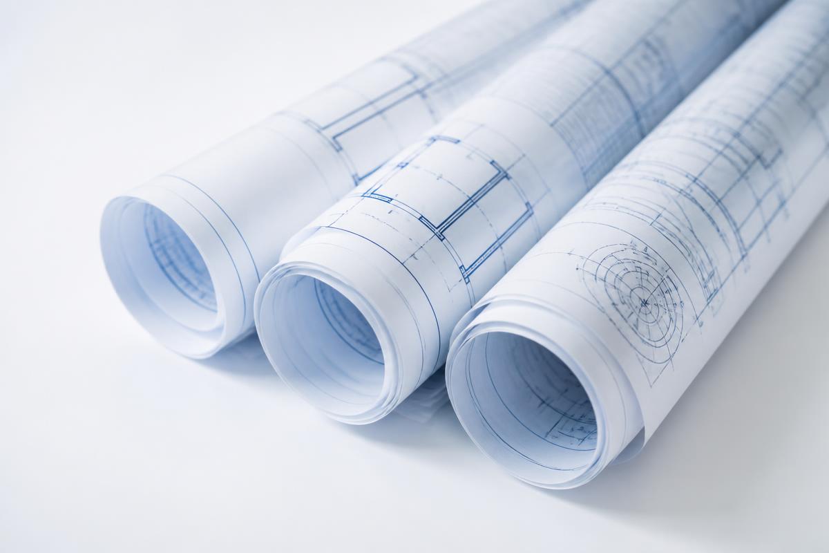 Rolled engineering blueprint drawings